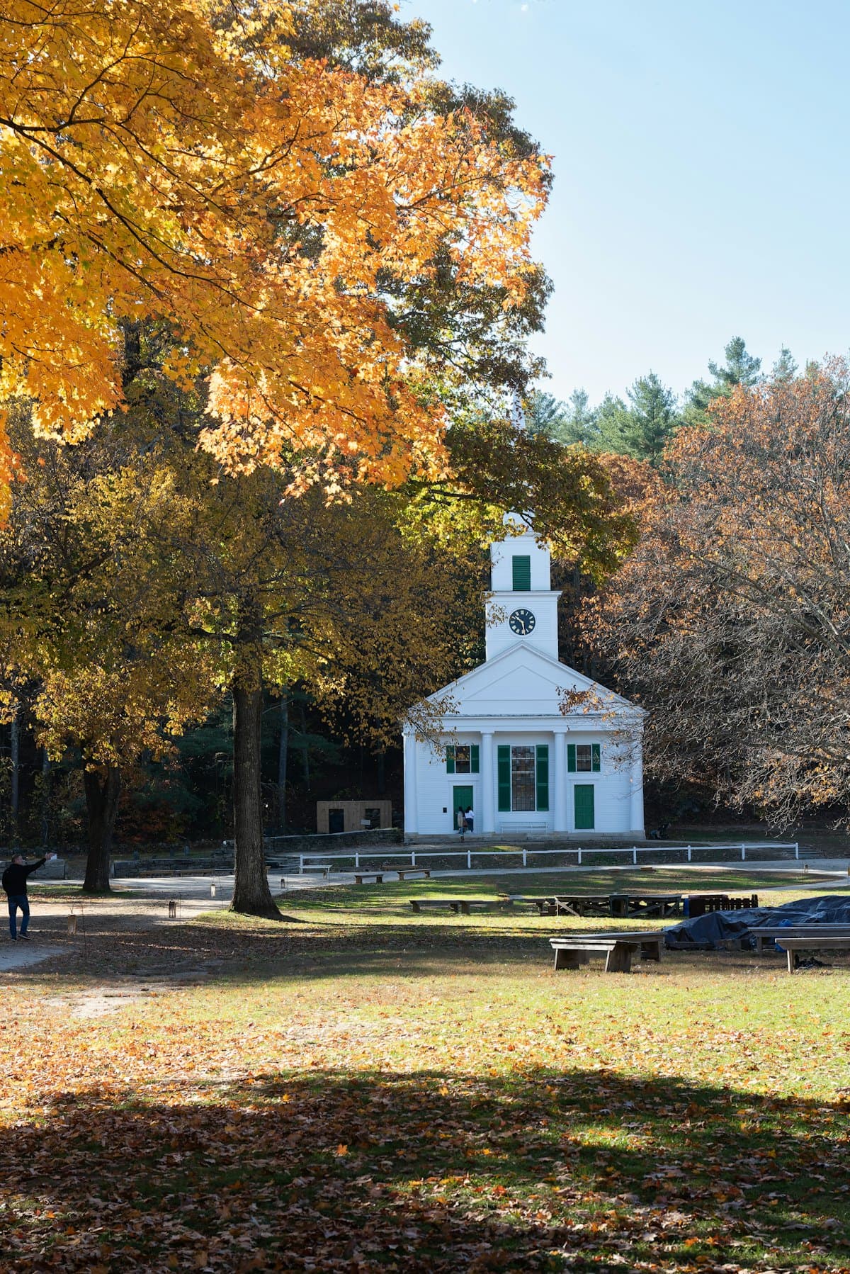 Historic white New England town building with a clock tower